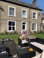 The front of the house. Michelle, the two kids, and two of the dogs are there too. We spend a lot of time in the garden.