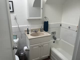 Bathroom with a tub and a separate shower