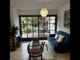 The sitting room, overlooking the garden.