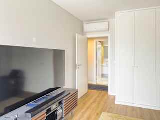 TV room with hallway access – ideal for remote work or movie night