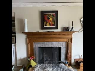 The living room has a fully functional wood burning fireplace.  The flue is operated manually and needs to be opened and closed if you have a fire.