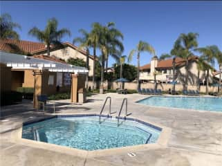 community pool area w/jacuzzi a few steps away