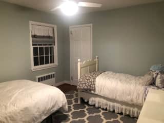 Guest bedroom has a twin and a full bed.