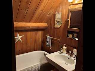 Second bath. This sink and tub are from the former Balsams hotel