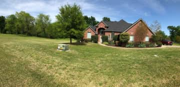 Pano of house and lot showing lots of room to roam