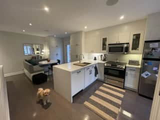 Kitchen and dining area. Features a very cozy banquette - Ernie's second favourite spot in the house.