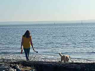 Walking the beach with Penny. Whidbey Island, Washington.