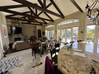 Family room and dining room, the kitchen island also shows in this picture