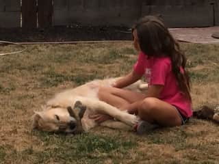 Our daughter, Chelsea, when we were watching our neighbor’s dog, Hank.