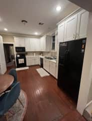 Living room opens up into Kitchen