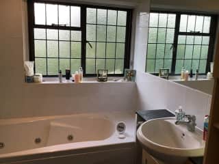 Main bathroom with jacuzzi bath