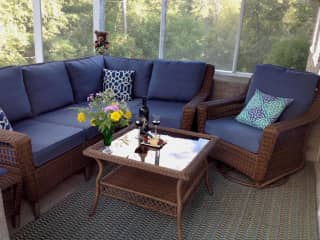 screen porch with a view of the lake