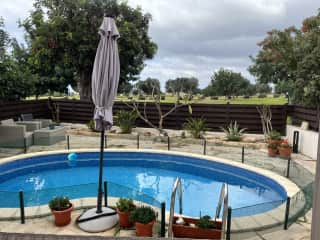 Garden and pool off downstairs terrace. Small fence round pool so blind and deaf cat won’t fall in!!