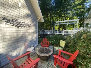 Firepit with hot tub in background. We now have a solo stove firepit.