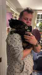 Max with Marmite the cat, who also loves cuddles!