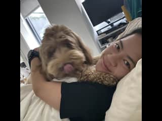 Morning snuggles with Kaia, an australian labradoodle!