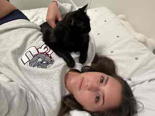 Relaxing with my senior cat, Shadow after a long day.