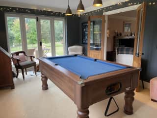 Pool room with patio doors to garden