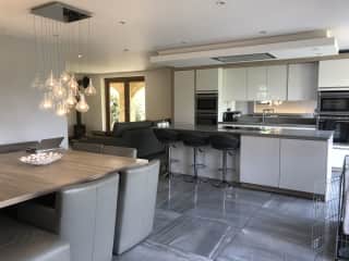 Our kitchen, dining, family area with bifold doors to the patio