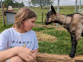 Ridley and one of our five goats, Finnick.