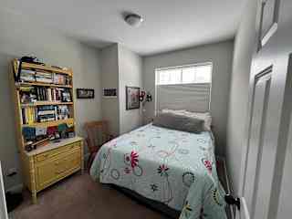 guest bedroom (with my daughter's old bed cover).