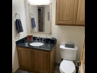 Sitter/guest bathroom. Shower doubles as a sauna