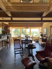 view from living area to dining area and outside