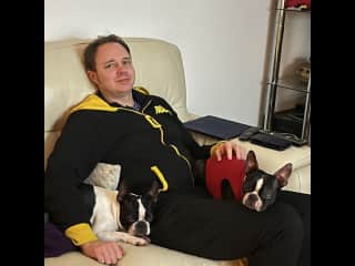 Andy giving up Xbox time for more cuddles, Boston Roxie (2.5 years) and Nala (7 months)