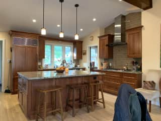 Kitchen with two ovens and gas stove