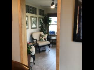 Sunroom overlooking backyard and golf course