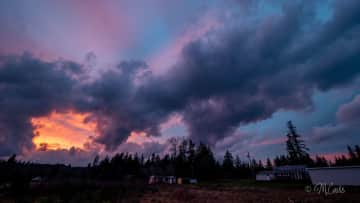 Sunset (our house on the right & our little AirBnb on the left).