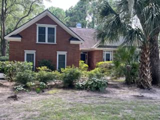 Front view of house; driveway and garage are to the left