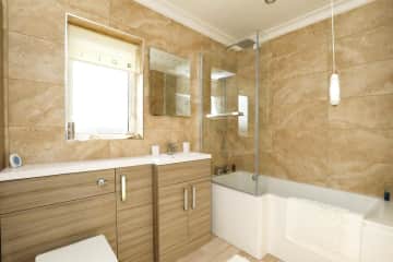 Modern bathroom with bath and shower