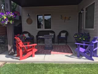 Lower shaded deck with plenty of seating and gas firepit