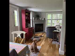 Dining area looking into gas fireplaces living room