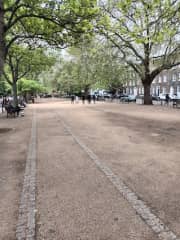 The central square is spacious and is popular with petanque players. You can take a pint from the pub into the square too.