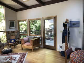 Living room area looking out onto entry deck