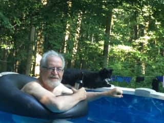 Teddy hanging at the pool with Ben.