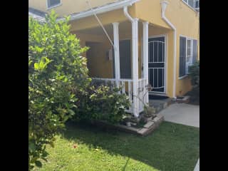 Front door and shared patio/yard