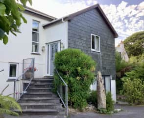 Front of house showing steps up to front door