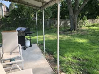 Back porch with gas grill and table/seating for 4.