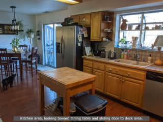 Here is a view from the kitchen area, looking toward the dining area. Chiapo the Kitty Cat is on the left side looking back and saying "hey come play with me in Reno."