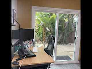 You can use my desk as a home office in our light filled, spacious sun room.
