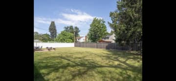 spacious backyard with patio