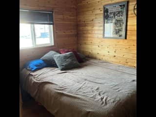 Spare bedroom with queen bed.