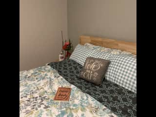 Guest Suite (bed, mirror, hanging space, table, private bathroom, private entrance + garage entry)