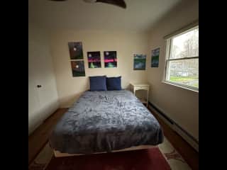 Enjoy a queen bed in your own guest room. It’s a good bed and we have high quality Brooklinen sheets and memory foam pillows. Plus each room upstairs has its own fan