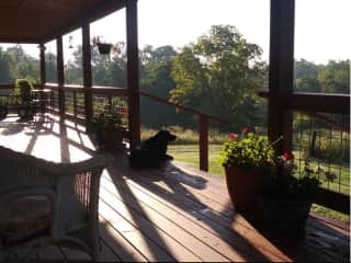 10' wide wrap around porch welcomes you to come and sit for a spell.