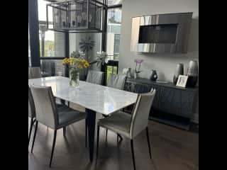 Dining room with fireplace on the wall