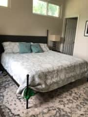 master bedroom w/ king bed